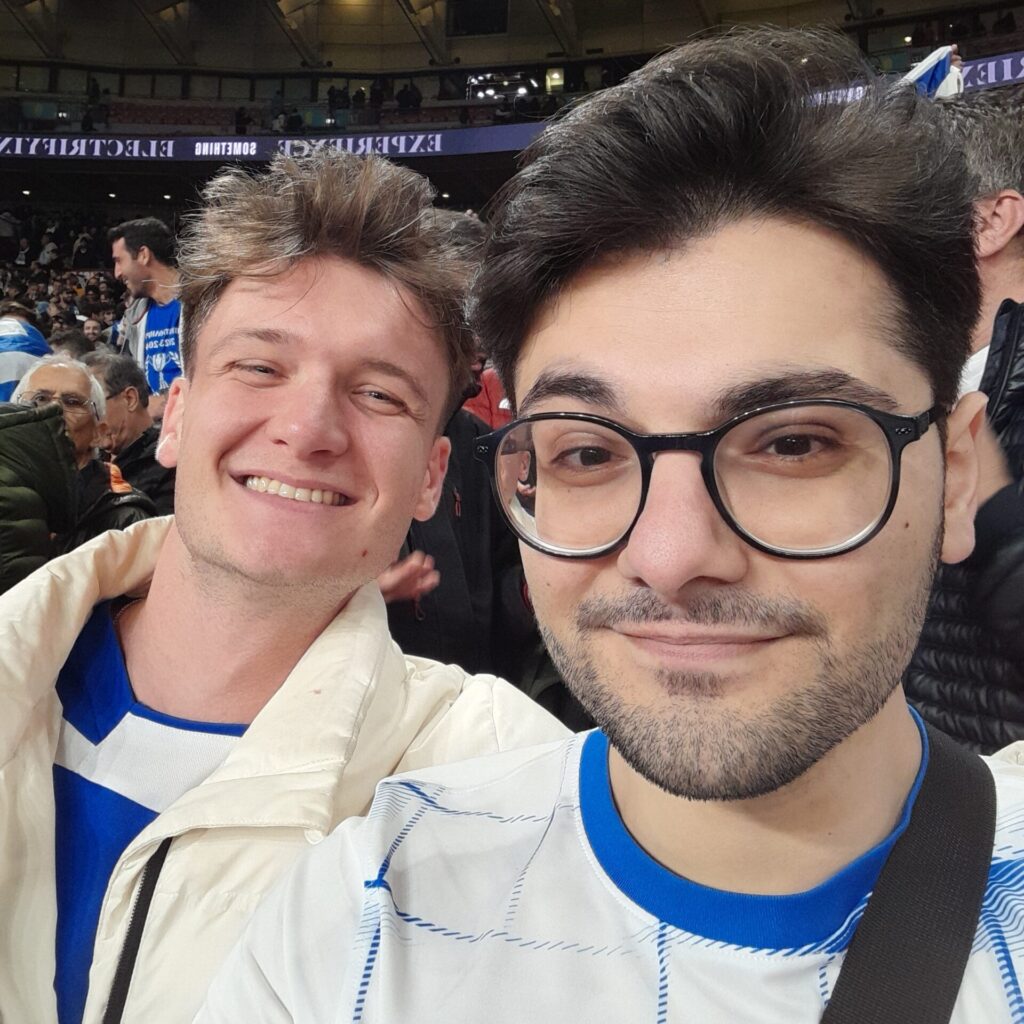 Stephen Kountourou and Alec McQuarrie celebrate after Greece defeat England at Wembley in October 2024